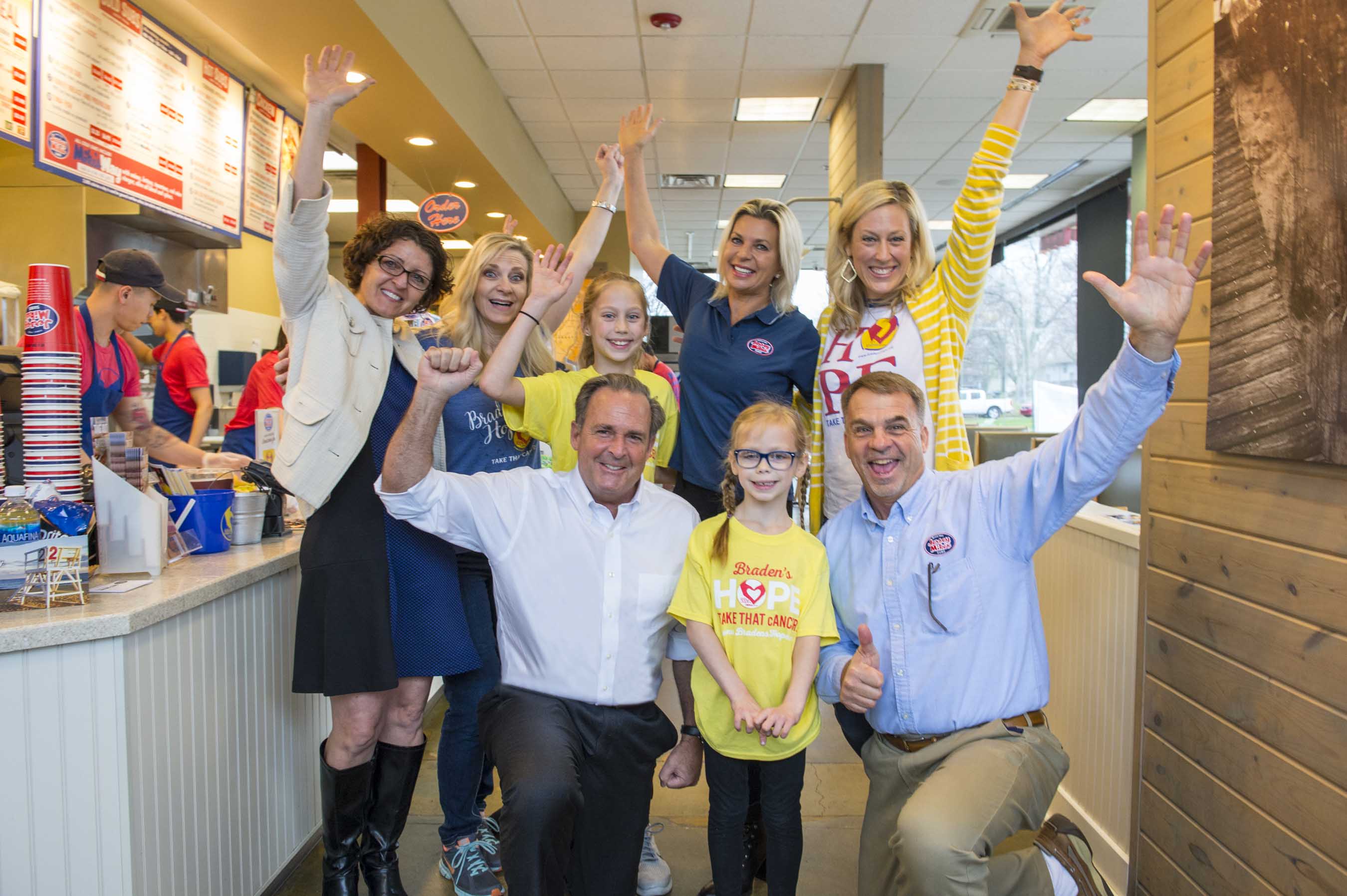 Jersey Mike's Family, hands in air in celebration